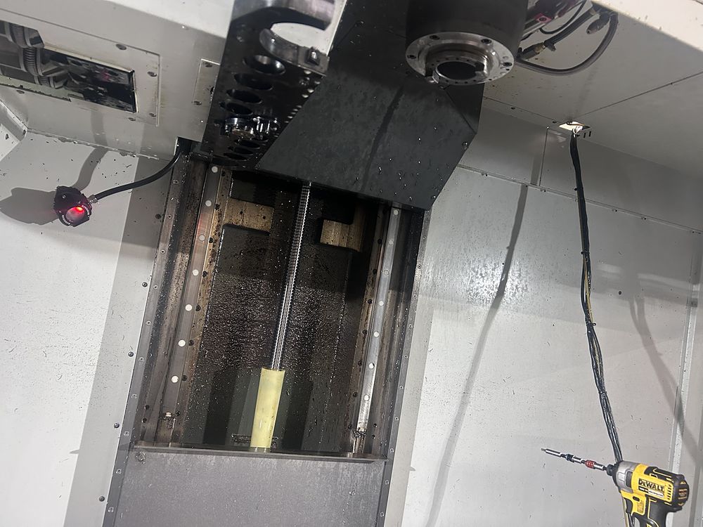 Z-axis ballscrew and linear guides behind the spindle head